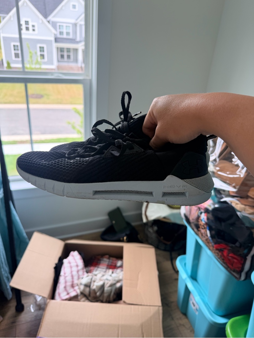 Under Armour Black Athletic Trainer with Light Blue Sole